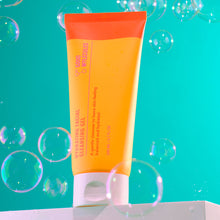 Load image into Gallery viewer, Hydrating Facial Cleansing Gel on teal background with bubbles