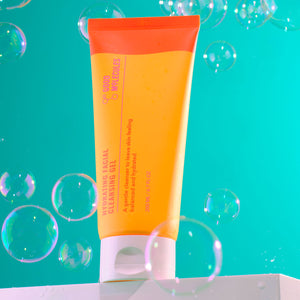 Hydrating Facial Cleansing Gel on teal background with bubbles